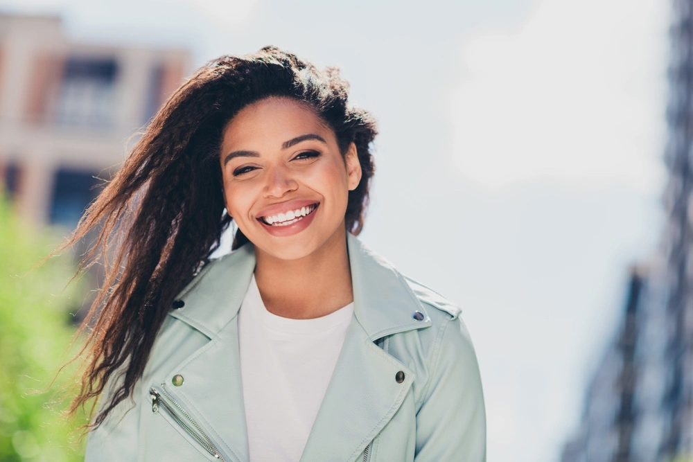 Smiling woman outdoors