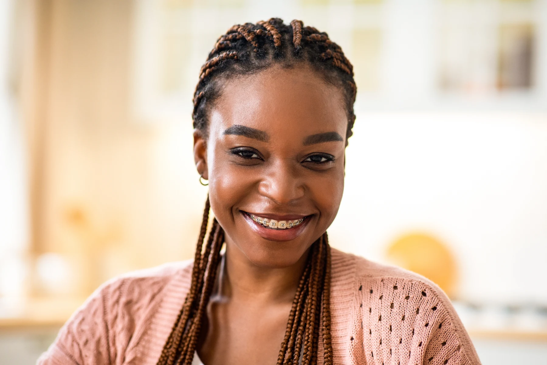 Woman smiling with braces